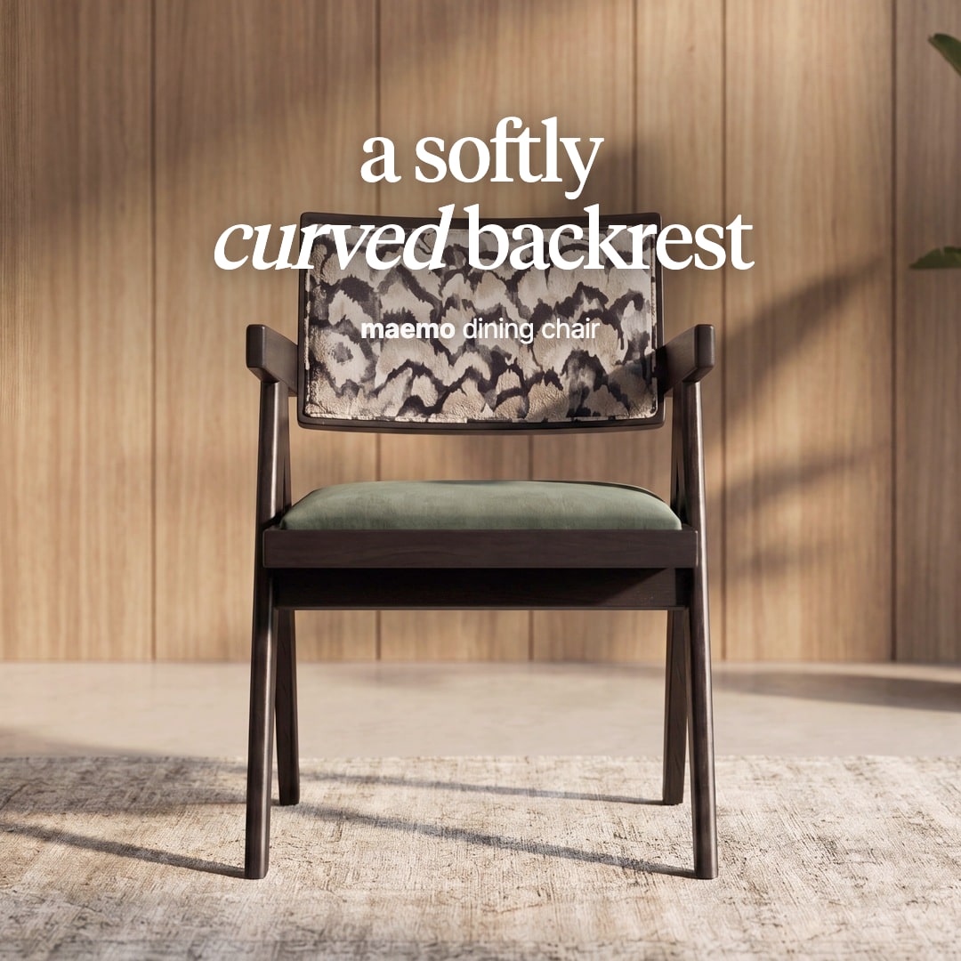 Maemo dining chair with a patterned fabric backrest, a green seat and a dark wooden frame. The image reads "a softly curved backrest, maemo dining chair".