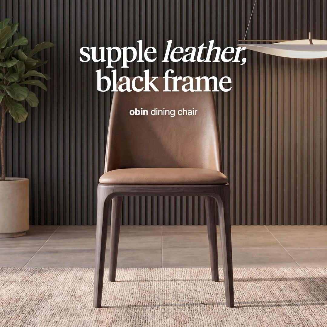 Obin dining chair in cognac leather on a black wooden frame. The image reads "supple leather, black frame, obin dining chair".