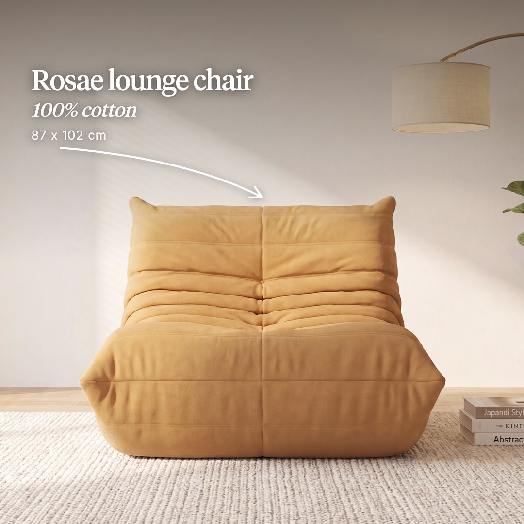 Rosae lounge chair, a low, deeply quilted seat in ochre. The image reads "Rosae lounge chair, 100% cotton, 87 x 102 cm".