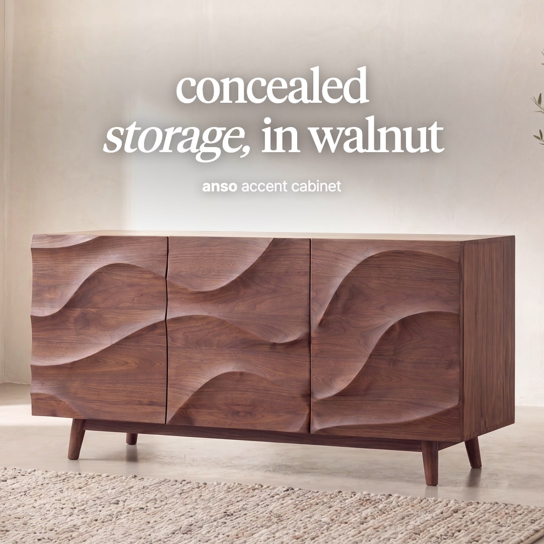 Anso sideboard in walnut veneer with wave-relief doors on angled legs. The image reads "concealed storage, in walnut, anso accent cabinet".