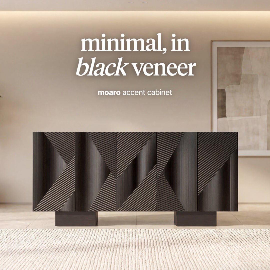 Moaro sideboard in black veneer with a fluted geometric front on two block feet. The image reads "minimal, in black veneer, moaro accent cabinet".