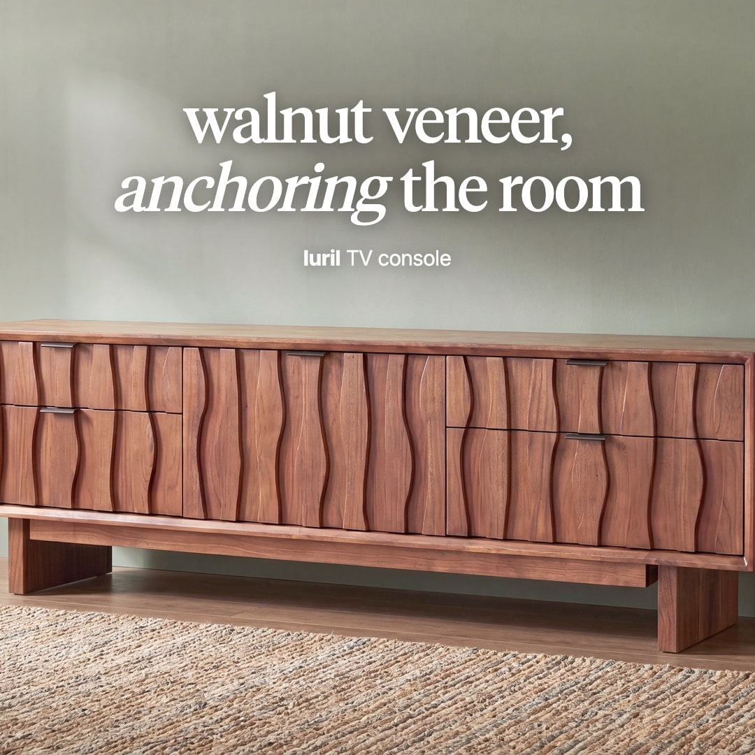 Luril TV console in walnut veneer with wavy carved fronts on slab legs. The image reads "walnut veneer, anchoring the room, luril TV console".