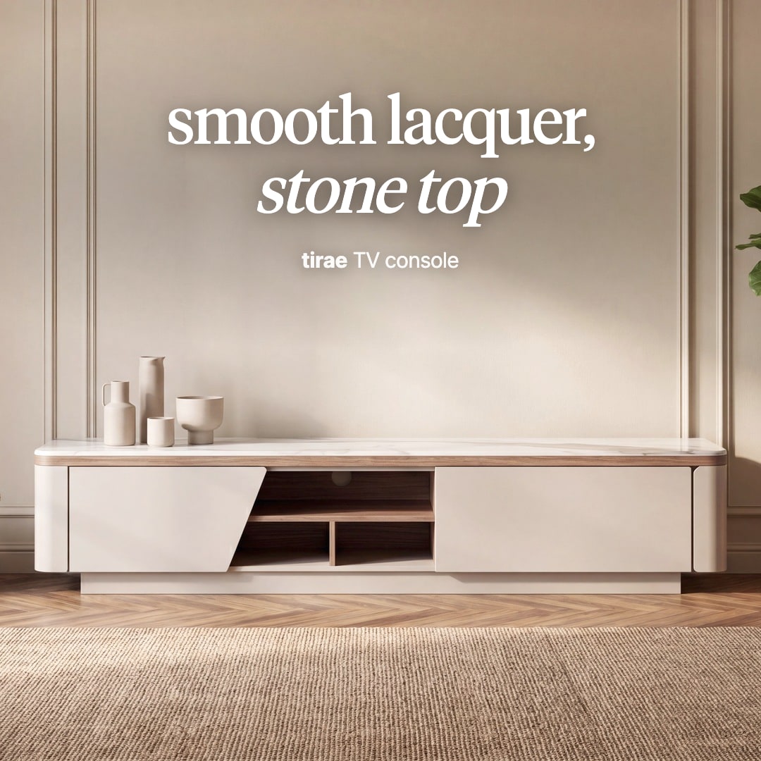 Tirae TV console in greige lacquer with a stone top and an open shelf. The image reads "smooth lacquer, stone top, tirae TV console".